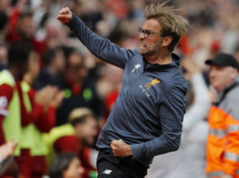 Jurgen Klopp took a sly dig at Manchester City coach Pep Guardiola over the phone