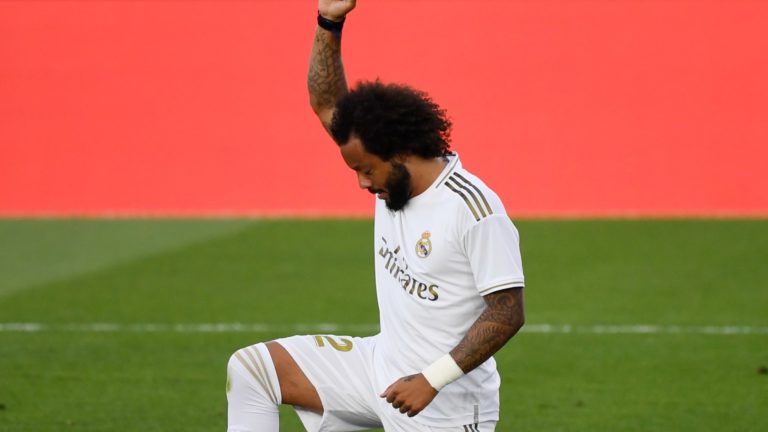 Stoop to conquer: Marcelo takes a knee after scoring for Real Madrid