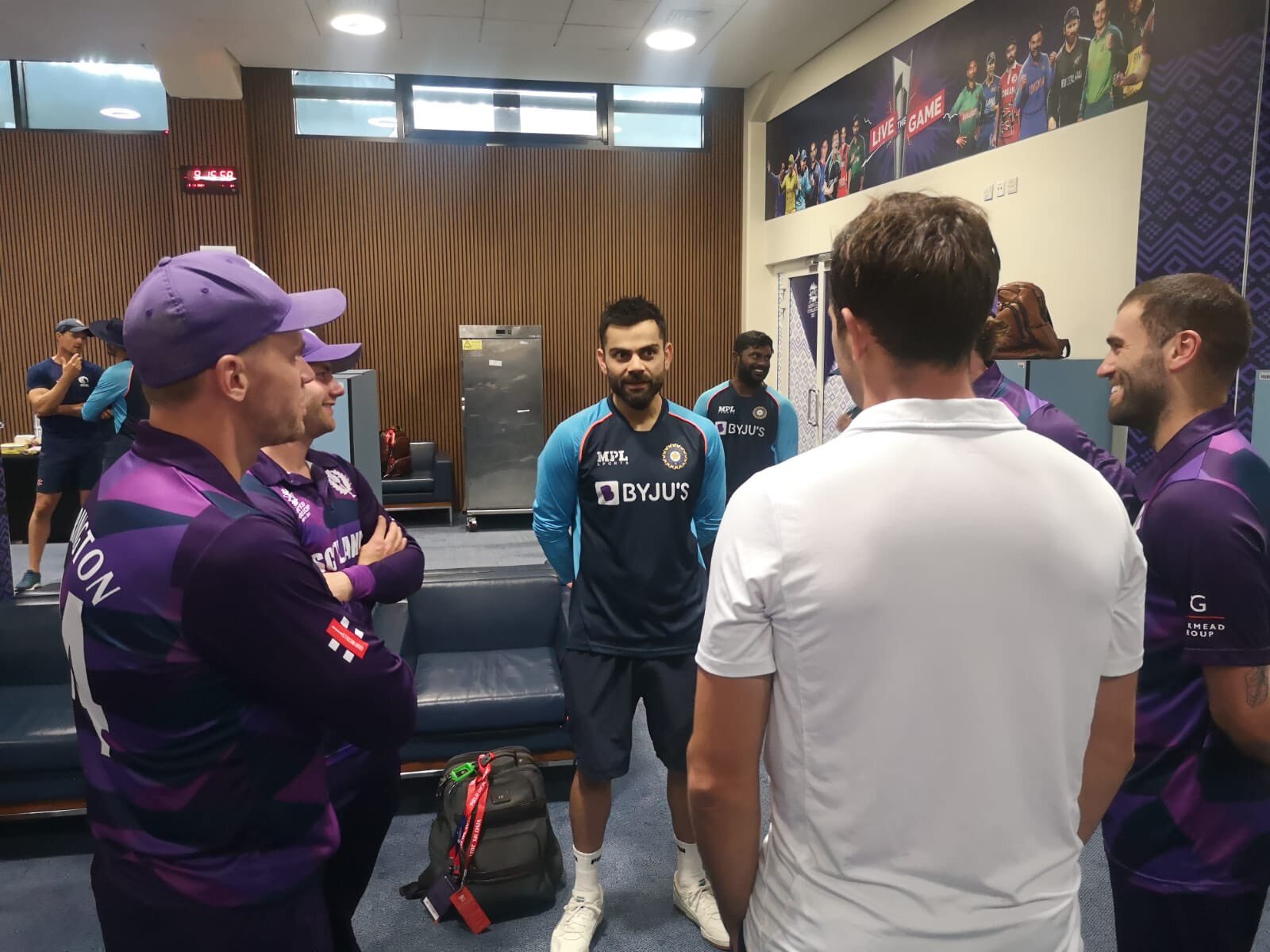 Team India pay a visit to Scotland dressing room post match 